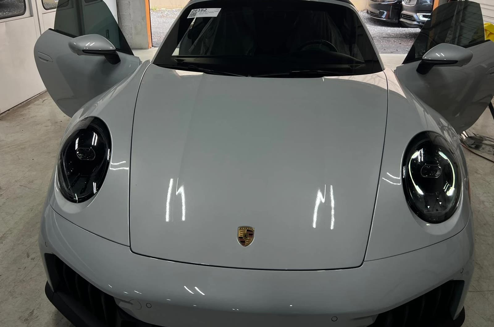 After: gray Porsche 911 Cabriolet with dark tinted windshield and side windows